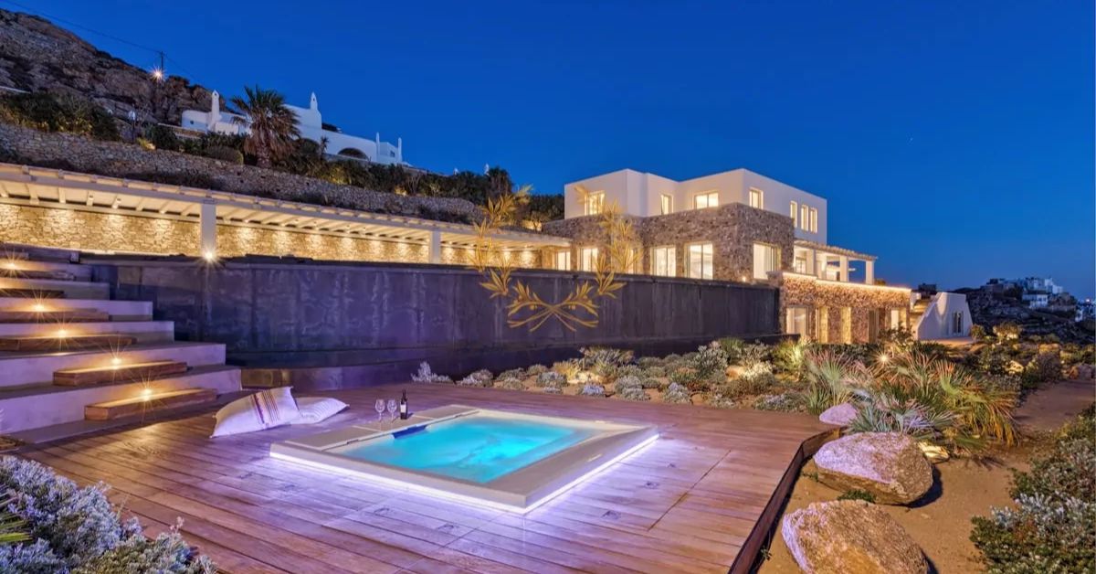 Ultra exclusive waterfront mega estate with private dock, enabling yacht integration for €1M summer lifestyles.