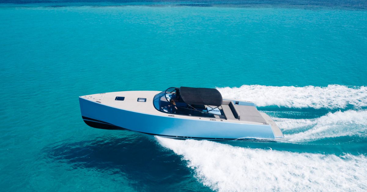 Van Dutch 40 cruising off Ibiza in clear summer light, capturing the sleek lines, speed, and effortless glamour of a luxury day charter en route to Formentera.