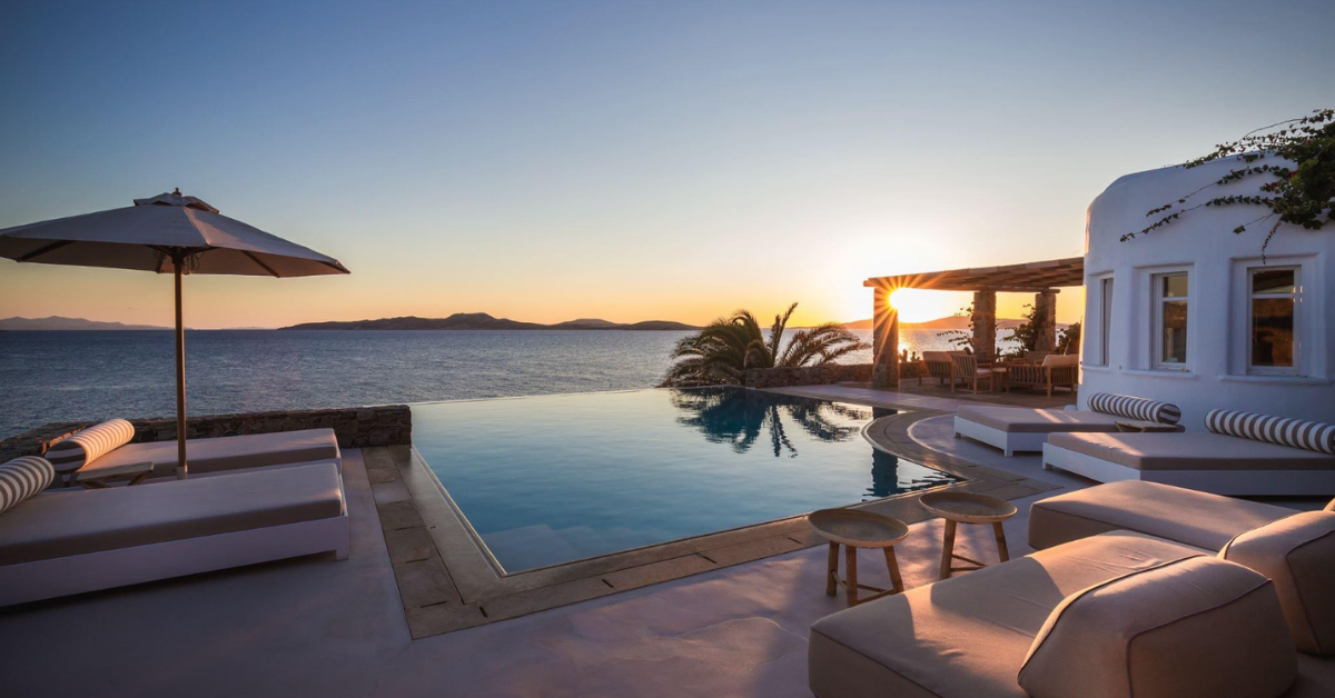 Luxury villa sunset in Mykonos with private pool overlooking the sea